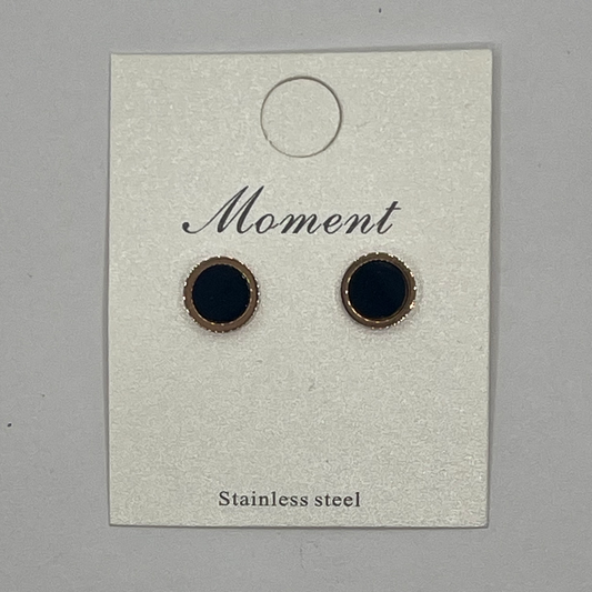 Pair of black earrings on a 'Moment' branded card with 'Stainless steel' text.