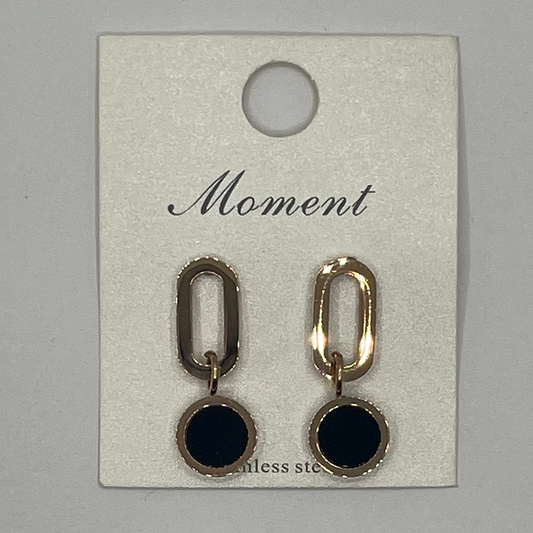 Pair of STAILESS STEEL earrings on a 'Moment' branded card 